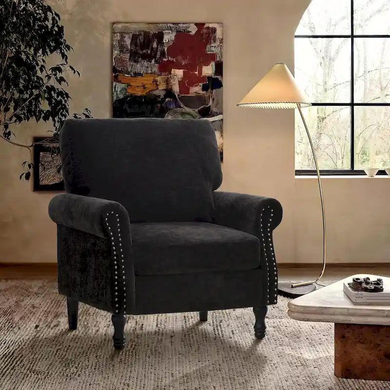 Fauteuil moderne rembourré avec clous décoratifs et pieds en bois